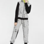 DOUBLEFACE ΖΑΚΕΤΑ ΜΕ ΦΘΟΡΕΣ ΓΚΡΙ-ΜΑΥΡΟ ΑΠΟ ΤΗΝ ΜΙΑ ΜΕΡΙΑ ΚΑΙ ΝΕΟΝ ΛΑΧΑΝΙ ΑΠΟ ΤΗΛ ΑΛΛΗ ΜΕΡΙΑ